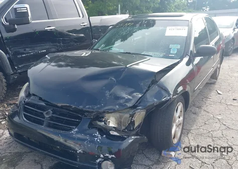 2001 Nissan Maxima Gle из США, поврежденный, VIN JN1CA31A31T318300